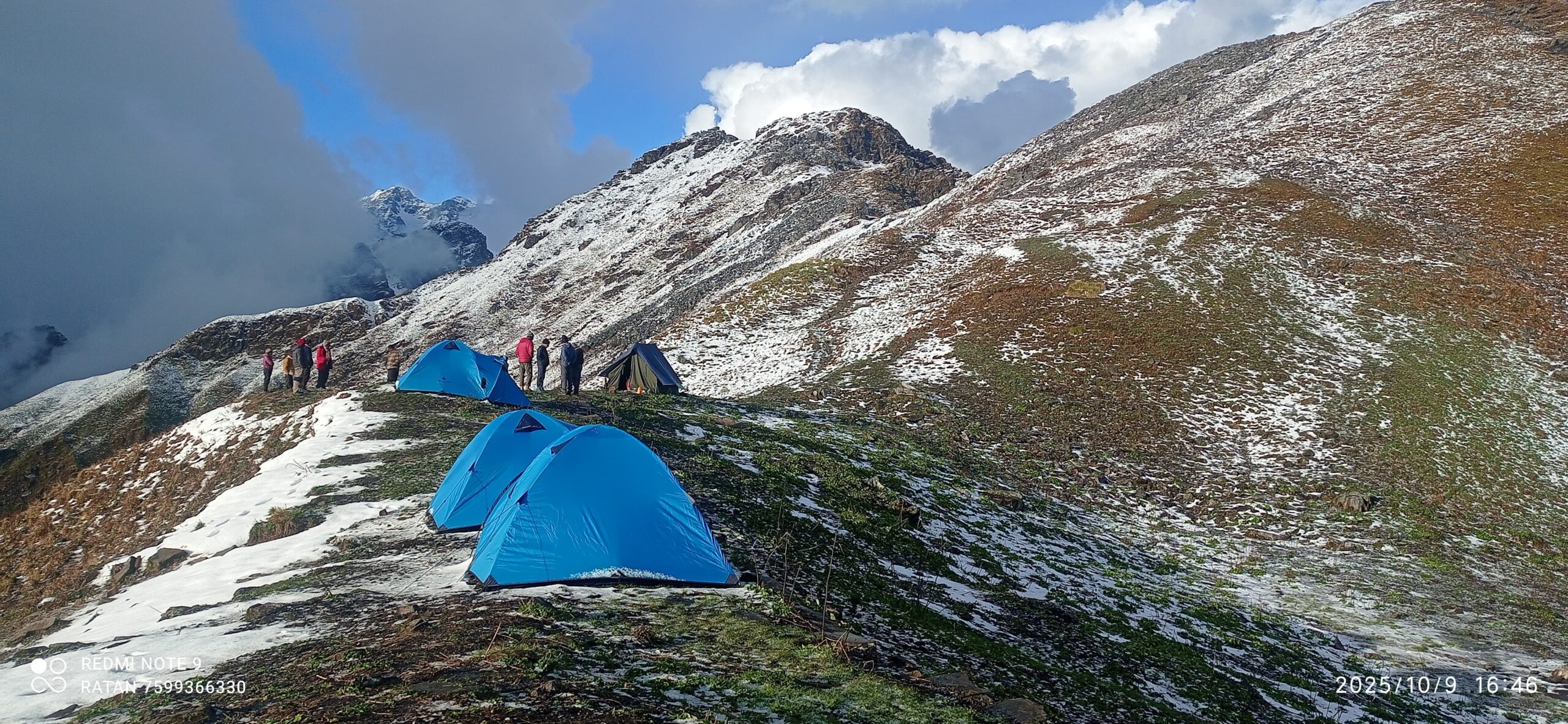 Professional trekking tents pitched at Chofu Top campsite under a clear starlit sky in the Kumaon Himalayas.