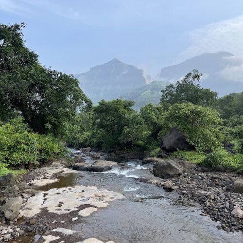 Panoramic view of the pristine green God Valley near Kalu Waterfall